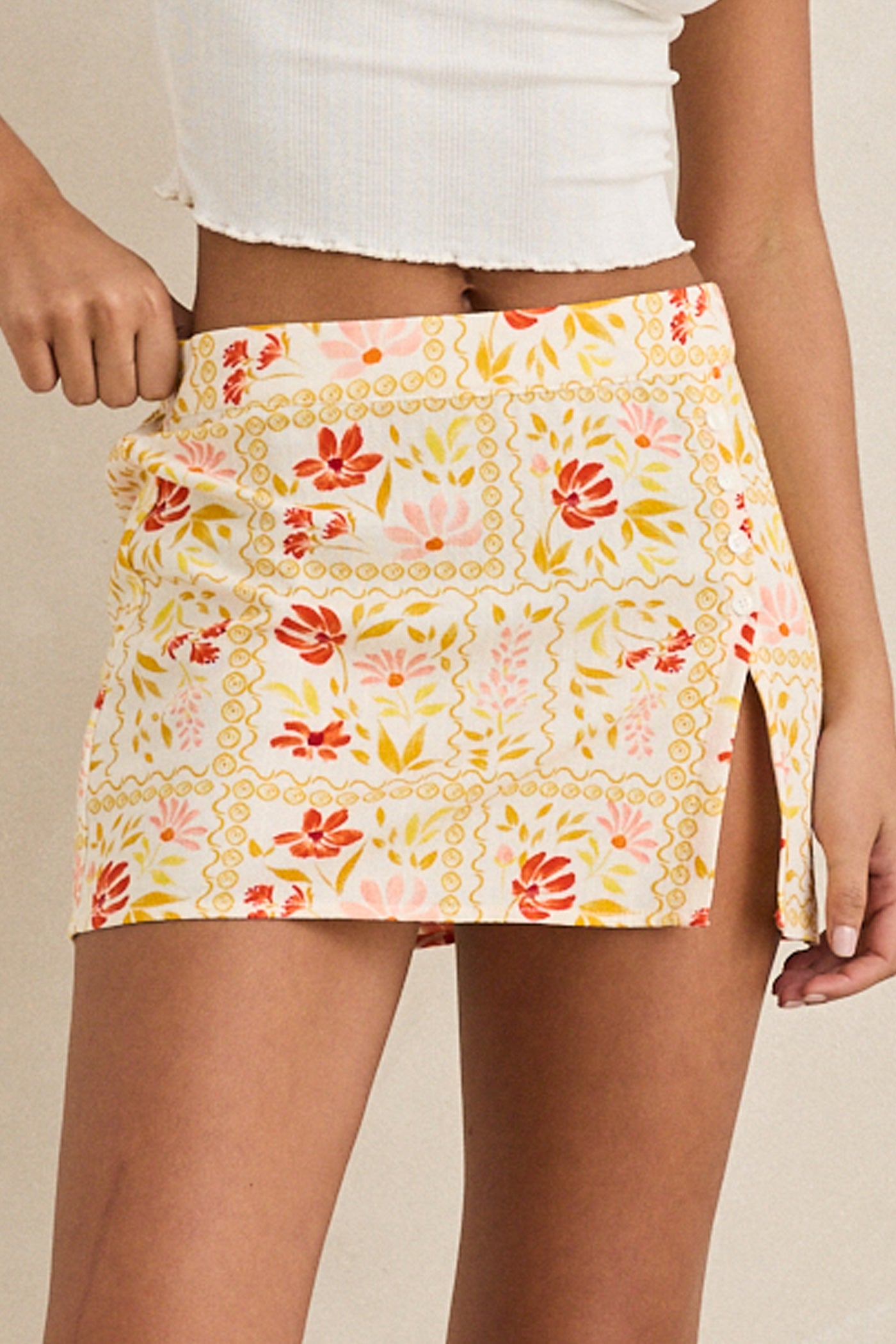 Rhythm Wildflower Mini Skirt in White - Front View | BikiniBird